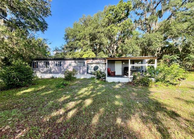 Property at 5811 Paul Buchman Hwy, Plant City, FL 33565, 3 beds, 2 baths