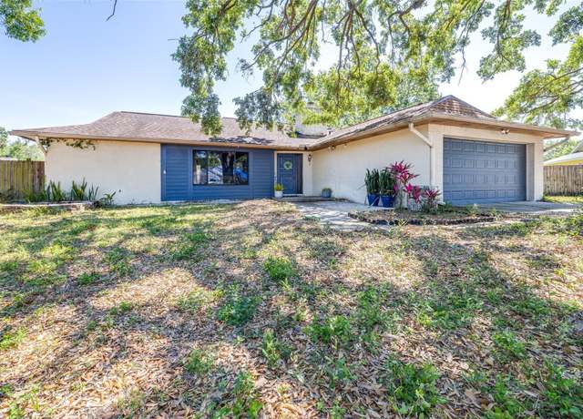 Property at 12503 Twisted Oak Dr, Tampa, FL 33624, 3 beds, 2 baths