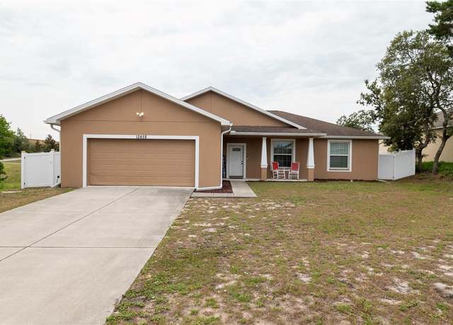 Property at 12458 Fish Cove Dr, Spring Hill, FL 34609, 5 beds, 3 baths