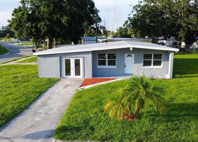 Property at 8502 Grapefruit Ave, Tampa, FL 33619, 4 beds, 2 baths