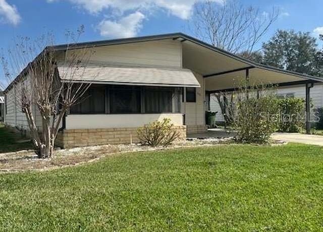 Property at 808 Coach N Four Dr, Leesburg, FL 34748, 2 beds, 2 baths