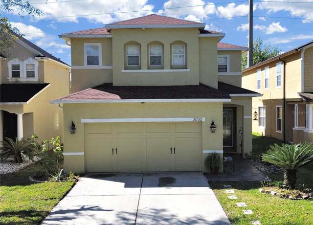 Property at 31730 Spoonflower Cir, Wesley Chapel, FL 33545, 4 beds, 2.5 baths