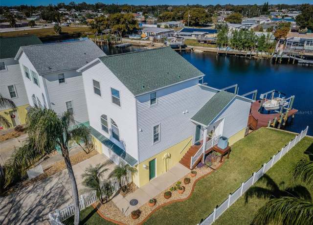 Property at 5305 Boardwalk St, Holiday, FL 34690, 3 beds, 2.5 baths