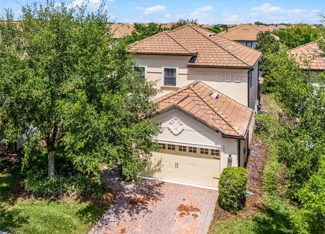 Property at 1424 Moon Valley Dr, Davenport, FL 33896, 5 beds, 4.5 baths
