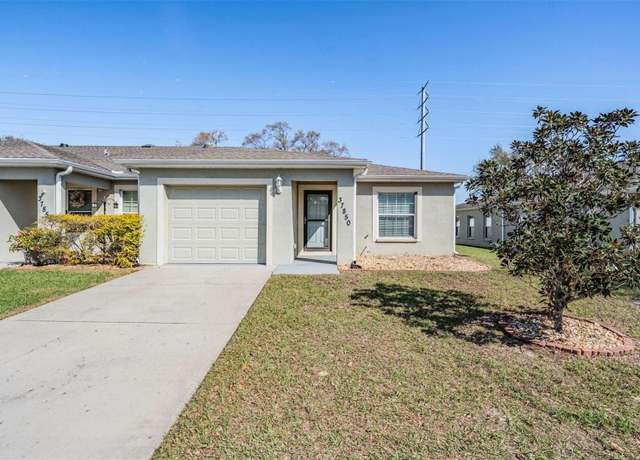 Property at 37850 Prairie Rose Loop, Zephyrhills, FL 33542, 3 beds, 2 baths