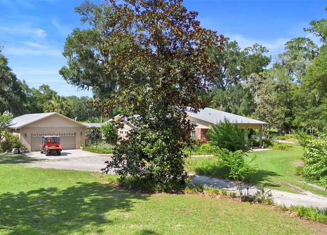 Property at 1056 Reynolds Rd, De Leon Springs, FL 32130, 4 beds, 4 baths