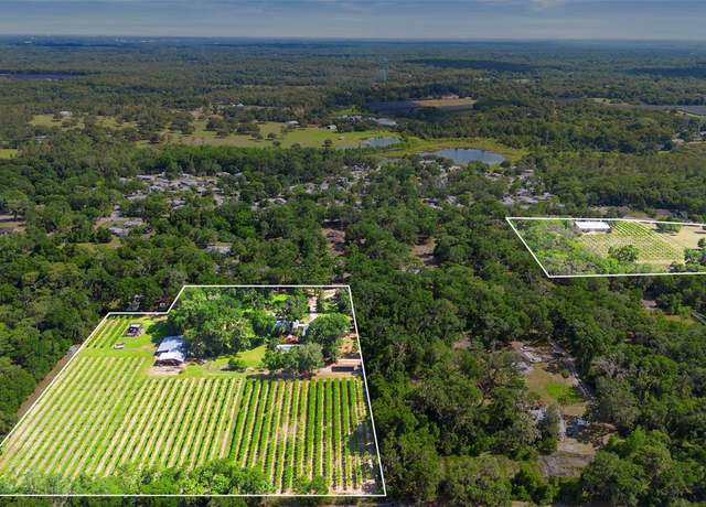 Property at 1056 Reynolds Rd, De Leon Springs, FL 32130, 4 beds, 4 baths