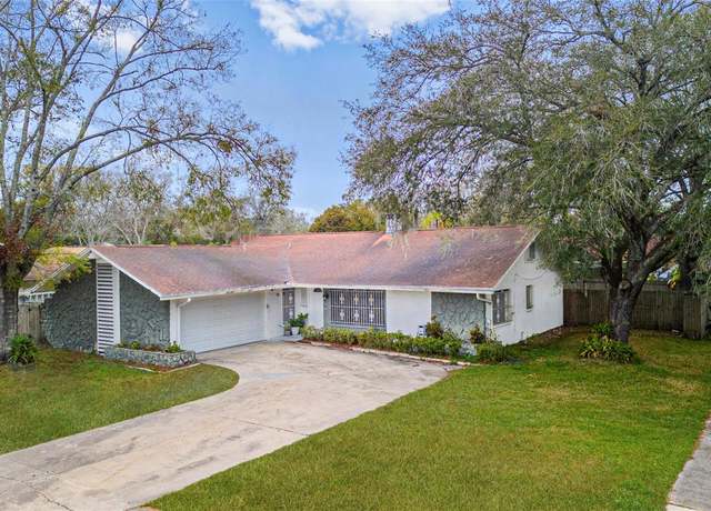 Property at 1712 Blind Pond Ave, Lutz, FL 33549, 4 beds, 2 baths