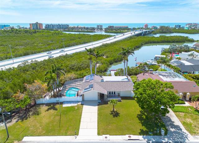 Property at 7906 Bayshore Dr, Seminole, FL 33776, 3 beds, 2 baths