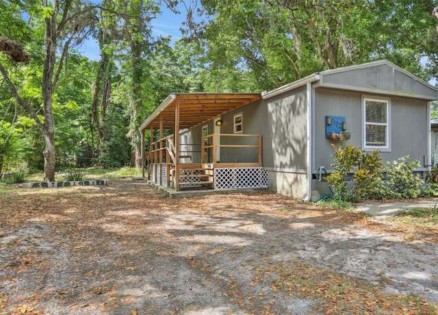 Property at 9132 Mango St, New Port Richey, FL 34654, 4 beds, 3 baths