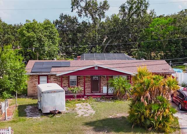Property at 2213 W Pilaklakaha Ave, Auburndale, FL 33823, 4 beds, 3 baths
