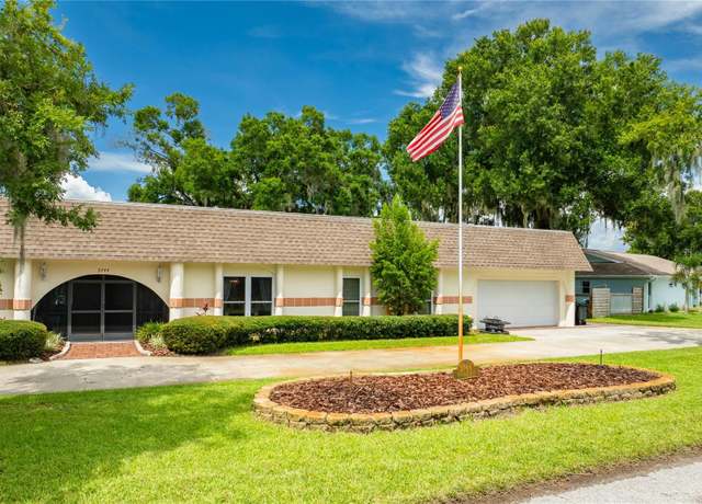 Property at 3744 E Lake Dr, Land O Lakes, FL 34639, 4 beds, 3 baths