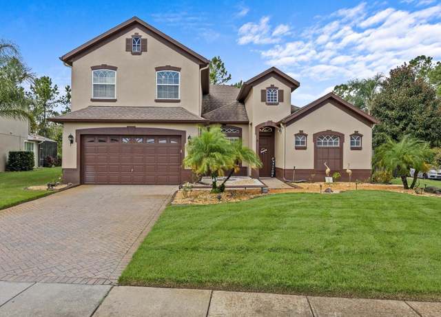 Property at 143 Brunswick Dr, Davenport, FL 33837, 5 beds, 4 baths