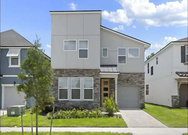 Property at 1929 Tropical Palms Cir, Kissimmee, FL 34747, 6 beds, 4.5 baths