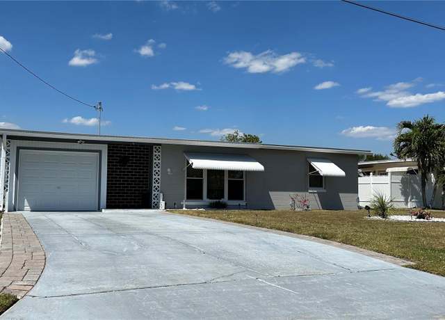 Property at 123 Poinsettia Cir NE, Port Charlotte, FL 33952, 2 beds, 2 baths