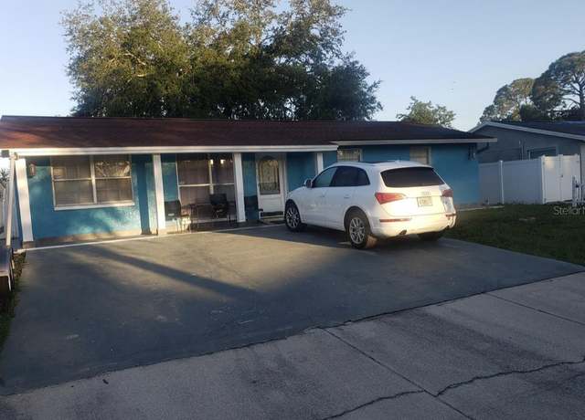 Property at 6718 Runningwoods Dr, Tampa, FL 33634, 3 beds, 2 baths