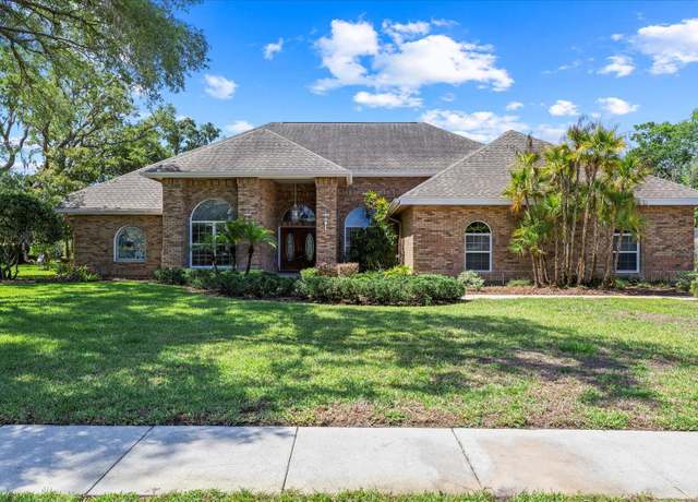 Property at 888 Royal Birkdale Dr, Tarpon Springs, FL 34688, 4 beds, 3 baths