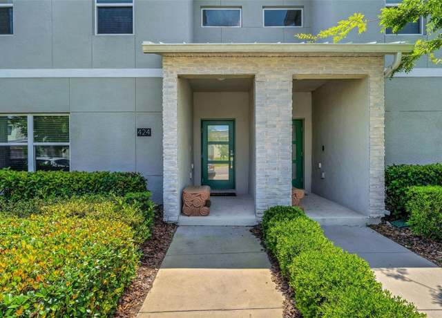Property at 424 Ocean Course Ave, Davenport, FL 33896, 4 beds, 3 baths