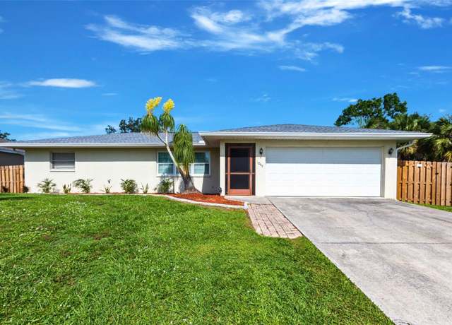 Property at 1049 Presque Isle Dr, Port Charlotte, FL 33952, 3 beds, 2 baths