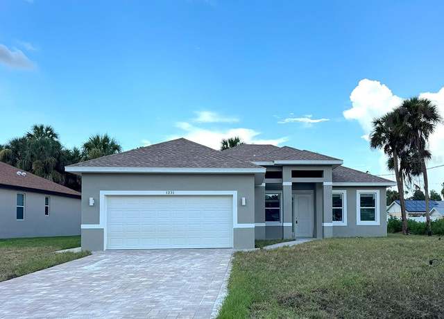 Property at 1231 S San Mateo Dr, North Port, FL 34288, 3 beds, 2.5 baths