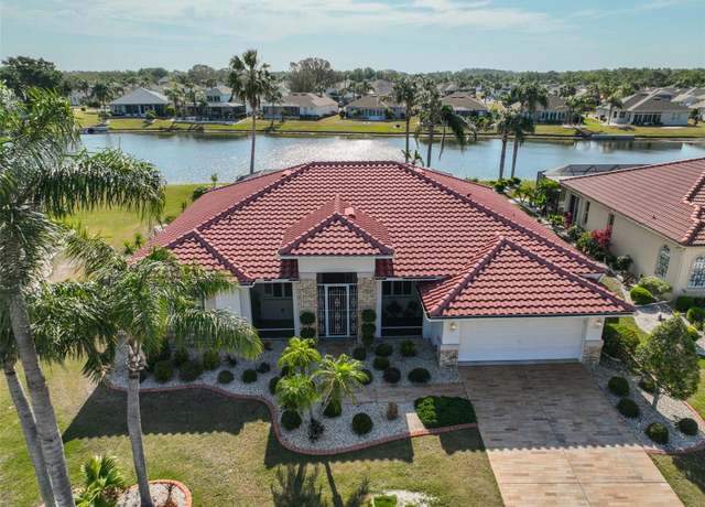 Property at 1123 Signature Dr, Sun City Center, FL 33573, 3 beds, 2 baths