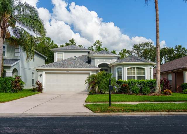 Property at 27312 Edenfield Dr, Wesley Chapel, FL 33544, 4 beds, 3 baths