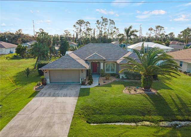 Property at 2112 S Chamberlain Blvd, North Port, FL 34286, 3 beds, 2 baths