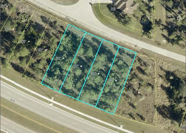 Property at 2540, 2542, 2544, 2546 Meadow Rd, Lehigh Acres, FL 33974