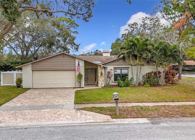 Property at 3005 Enisglen Dr, Palm Harbor, FL 34683, 5 beds, 3 baths