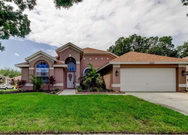 Property at 28826 Windover St, Wesley Chapel, FL 33545, 4 beds, 2 baths