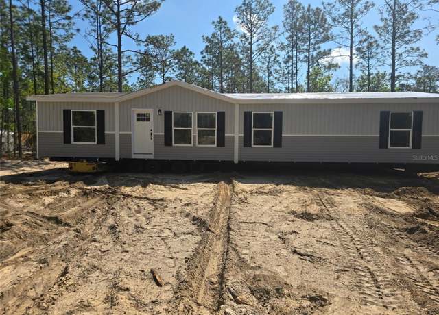 Property at 611 NE 130 Ave NE, Williston, FL 32696, 4 beds, 2 baths