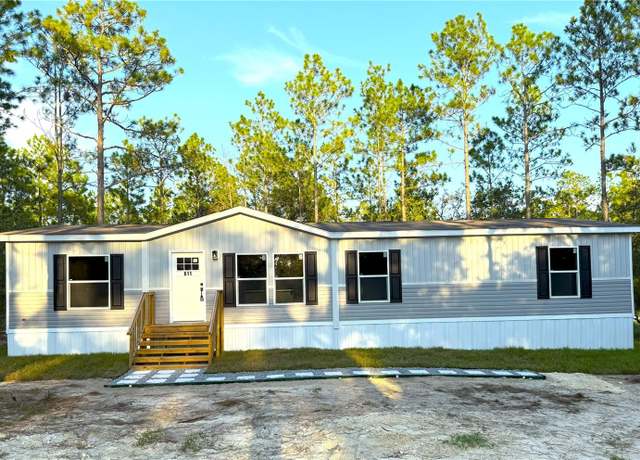 Property at 611 NE 130 Ave NE, Williston, FL 32696, 4 beds, 2 baths