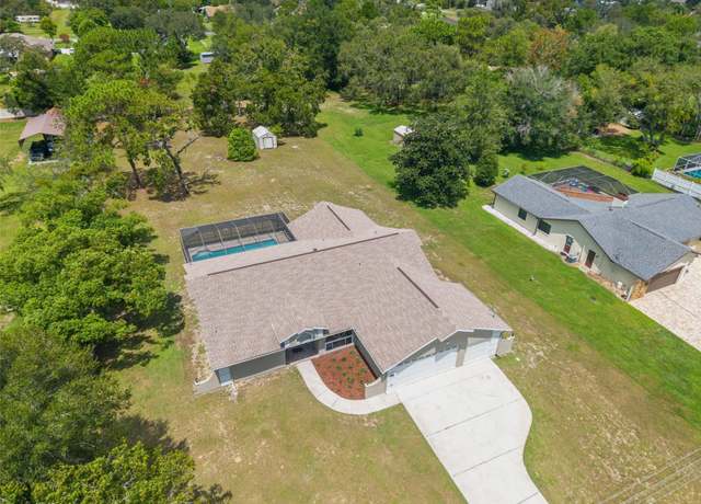 Property at 3385 Spring Park Way, Spring Hill, FL 34604, 3 beds, 2 baths