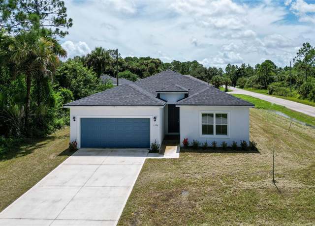 Property at 1396 Gibbs Rd SW, Palm Bay, FL 32908, 4 beds, 3 baths