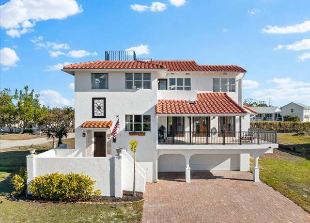 Property at 130 Green Dolphin Dr, Placida, FL 33946, 3 beds, 3.5 baths