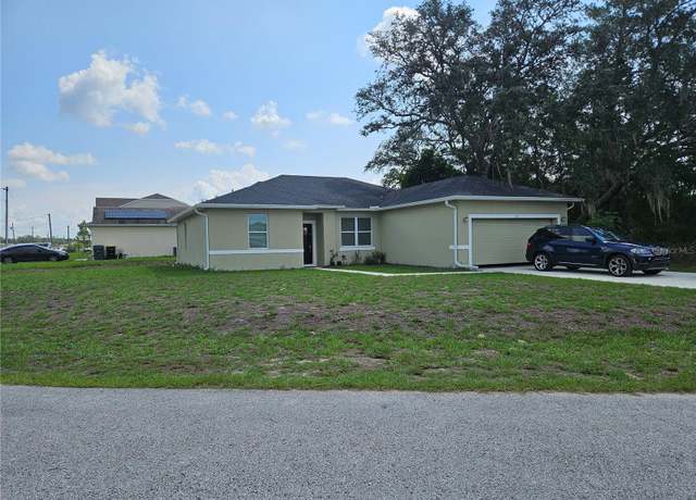 Property at 120 Zinnia Ln W, Kissimmee, FL 34759, 4 beds, 2 baths