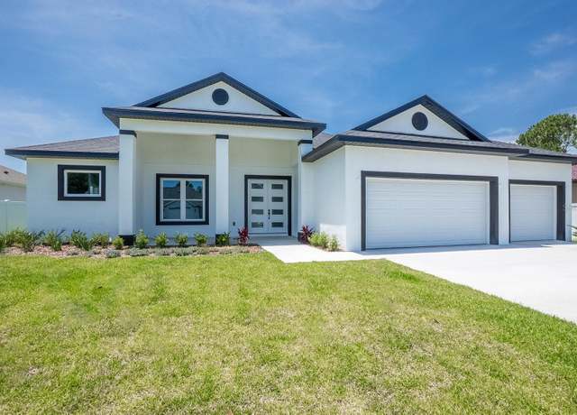 Property at 72 Flemingwood Ln, Palm Coast, FL 32137, 4 beds, 3 baths