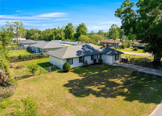 Property at 1401 NW 63rd Pl, Ocala, FL 34475, 4 beds, 2 baths