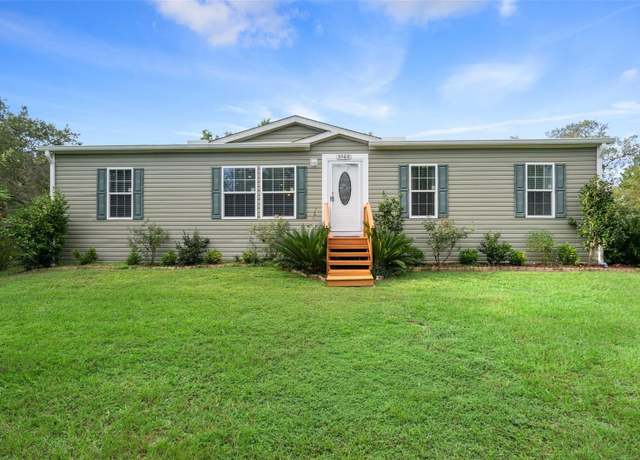 Property at 5560 W Cedar Hill St, Dunnellon, FL 34433, 4 beds, 2 baths
