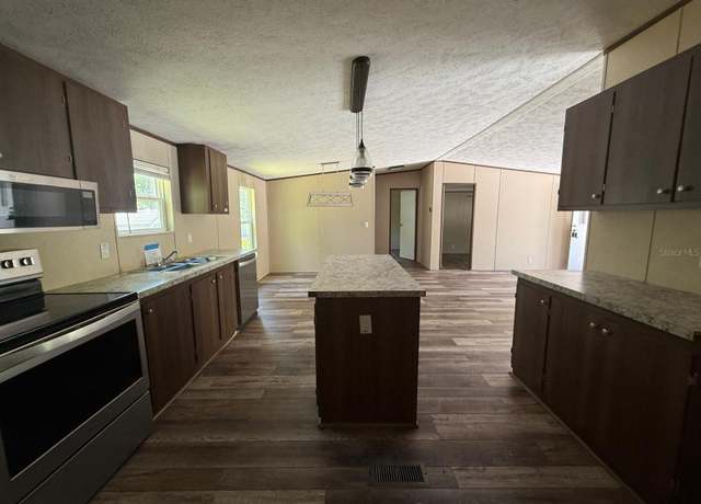 Property at 56048 Blue Creek Rd, Astor, FL 32102, 3 beds, 2 baths