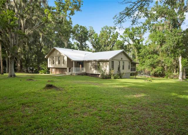 Property at 10420 Carlin Dr, Brooksville, FL 34601, 4 beds, 2.5 baths