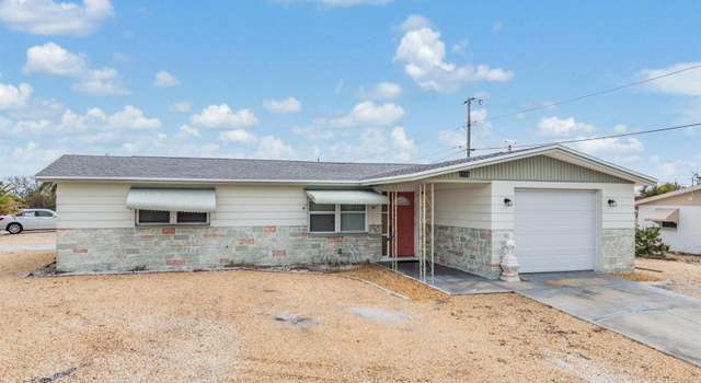 Photo of 1118 Excalibur St, Holiday, FL 34690