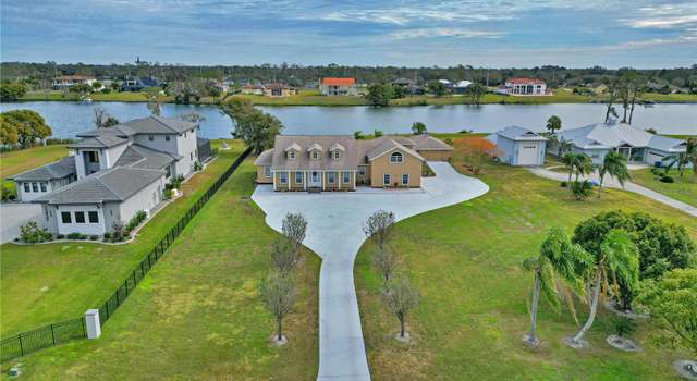 Photo of 13033 Mcintosh Lakes Ln, Dover, FL 33527