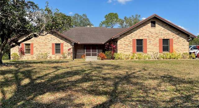 Photo of 1990 Spruce Creek Cir N, Port Orange, FL 32128