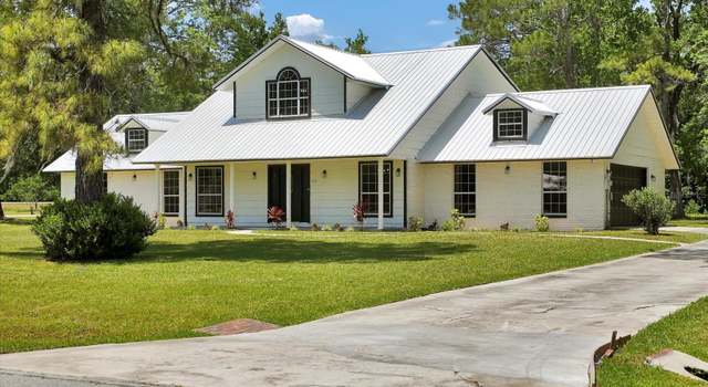Photo of 100 Redbud Woods Trl, Palatka, FL 32177