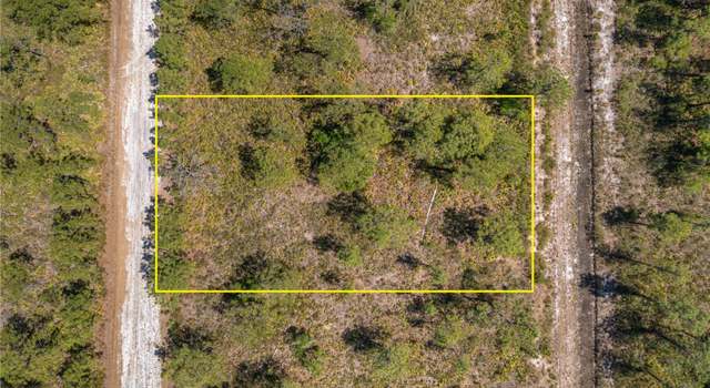 Photo of 419 Bougainville Dr, Indian Lake Estates, FL 33855