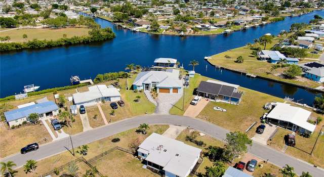 Photo of 140 Poinsettia Cir NE, Port Charlotte, FL 33952