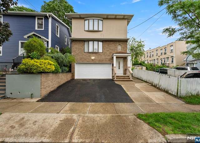 Property at 409 Washington St, Carlstadt, NJ 07072, 3 beds, 3.5 baths