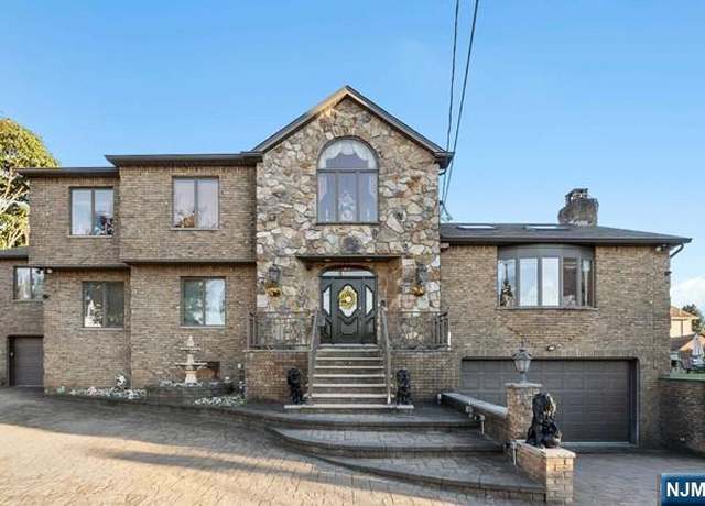 Property at 512 Van Bussum Ave, Garfield, NJ 07026, 4 beds, 3.5 baths