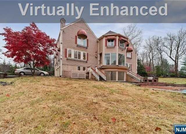 Property at 210 N Woodland St, Englewood, NJ 07631, 5 beds, 5 baths